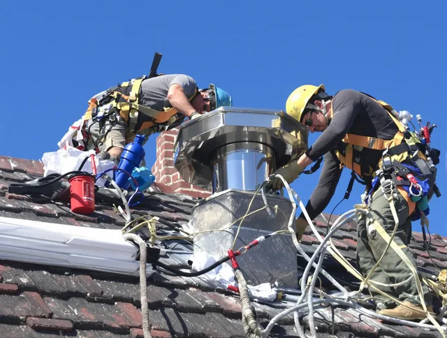 Protective chimney cap installed by Solon Chimney Sweep in Solon, OH