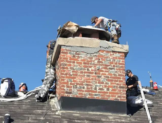 Solon Chimney Sweep installing a custom chimney crown in Solon, OH