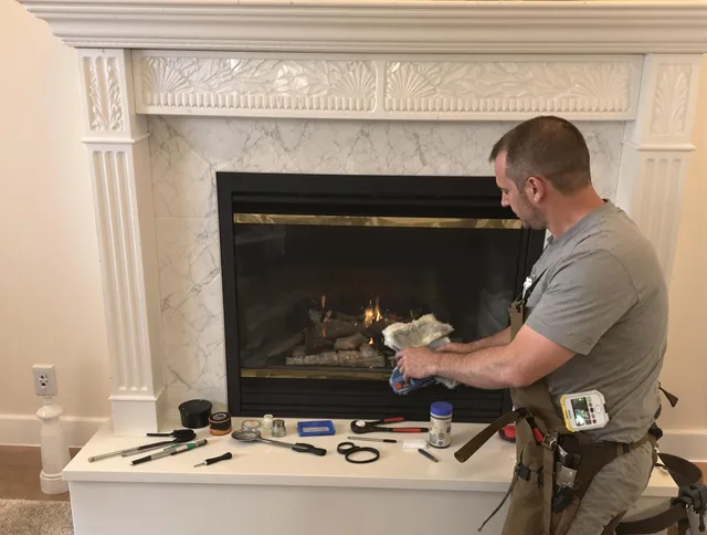 Solon Chimney Sweep performing fireplace maintenance in Solon, OH